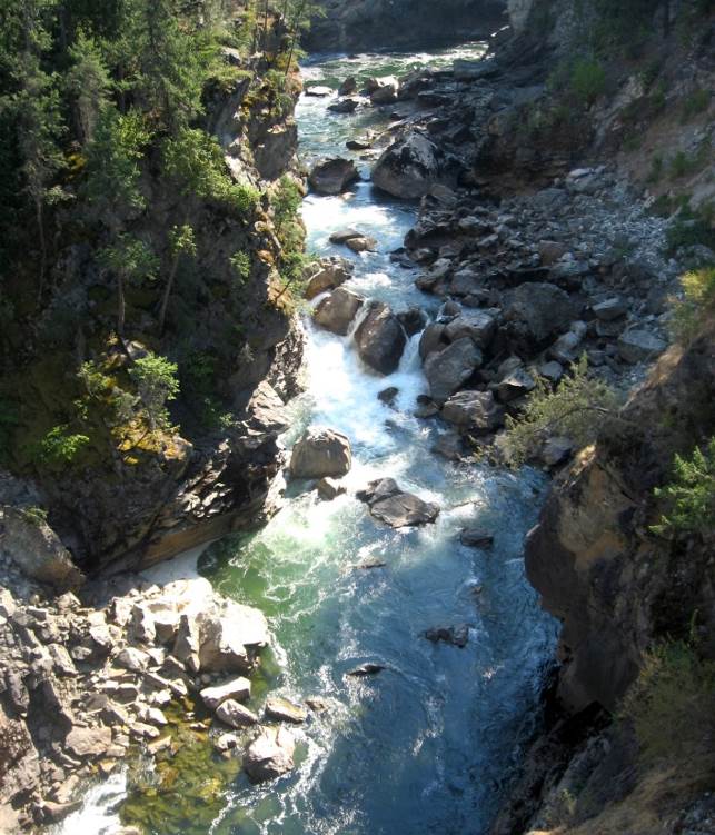 Figure 13.18 The Cascade Falls area of the Kettle River, near Christina Lake, B.C. This stream has a step-pool morphology and a deep bedrock channel. [SE]
