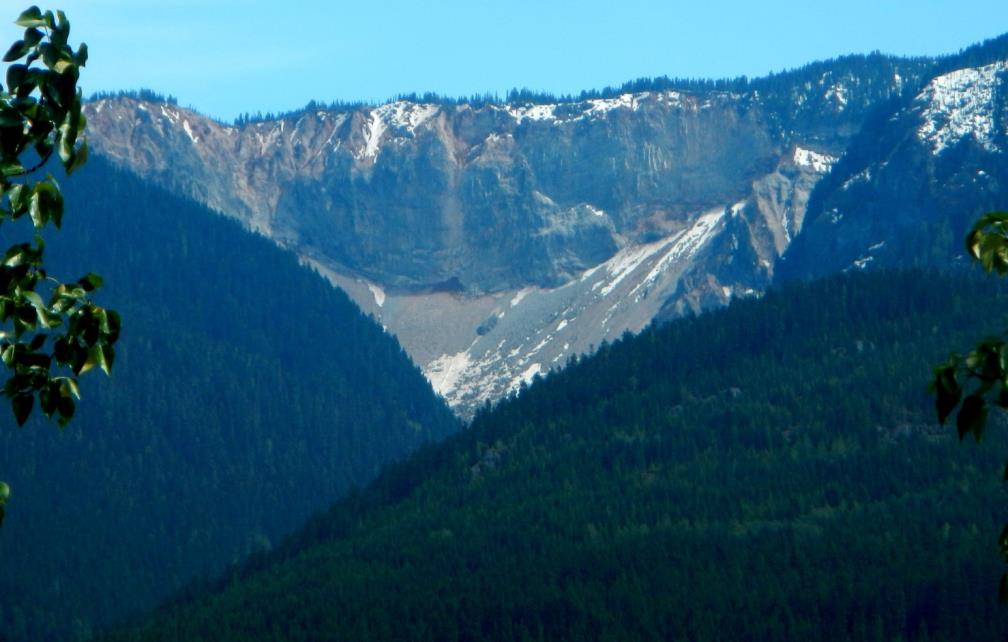 Figure 15.23 The Barrier, south of Whistler, B.C., was the site of a huge rock avalanche in 1855, which extended from the cliff visible here 4 km down the valley and across the current location of the Sea-to-Sky Highway and the Cheakamus River. [SE]