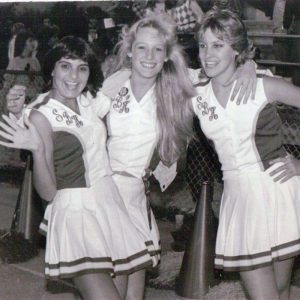 Cheerleaders pictured in a 1980s high school year book.